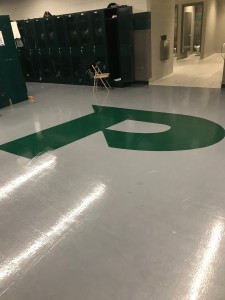 Painted Pelham logo for locker room floor.